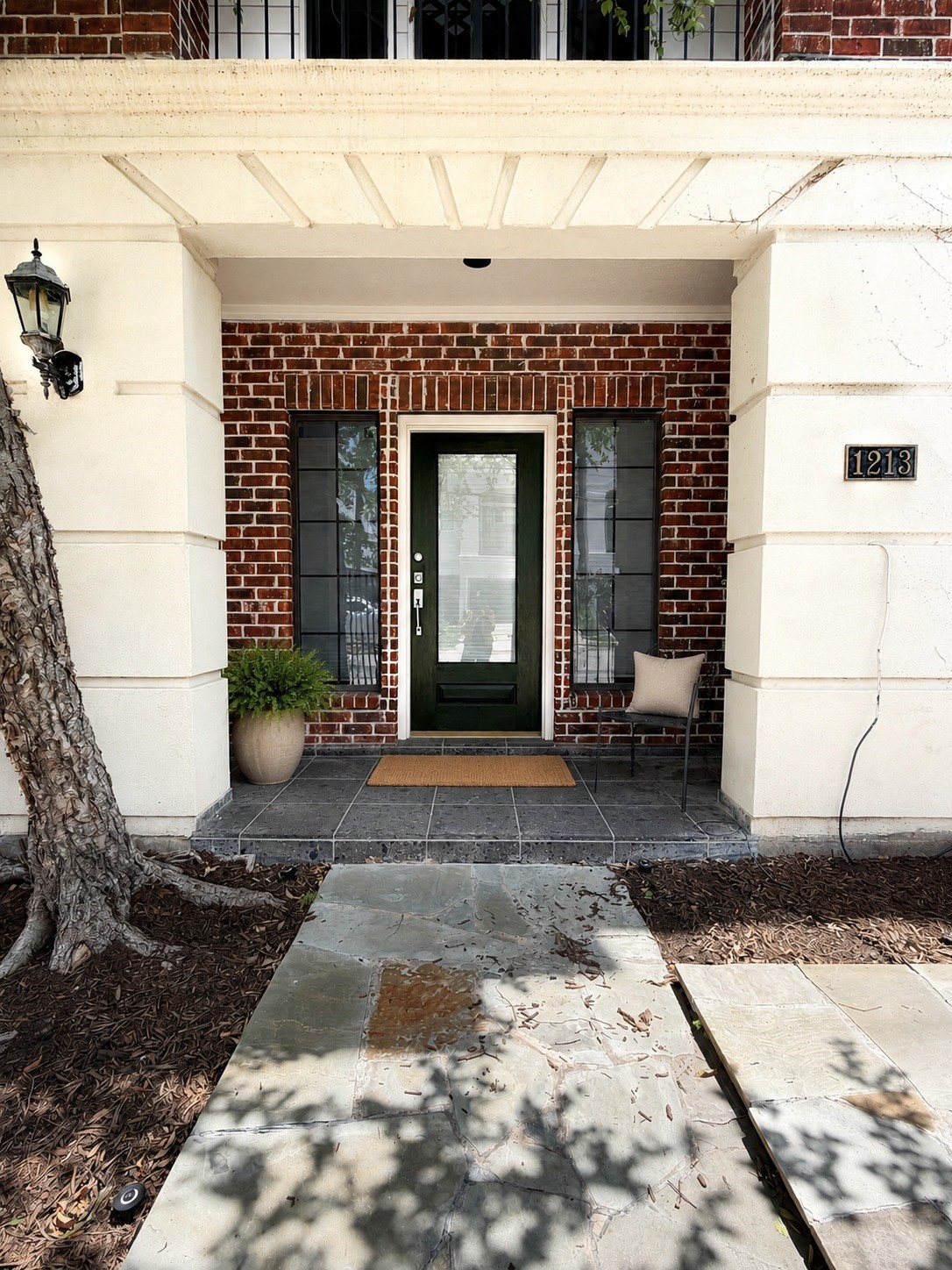 1213 Dunlavy Street Houston, TX 77019 - Photo 3 of 27 a front view of a house with a garage
