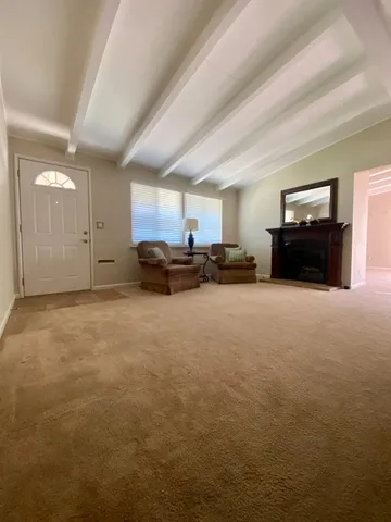 a living room with a fireplace