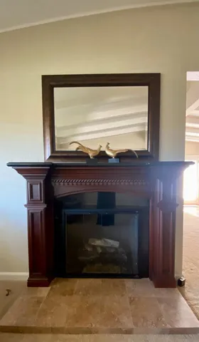 a large kitchen with stainless steel appliances a refrigerator and a sink