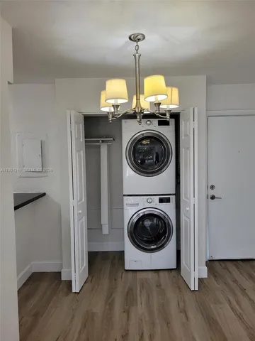 a view of entry way with wooden floor