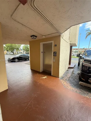 a view of a park with swings