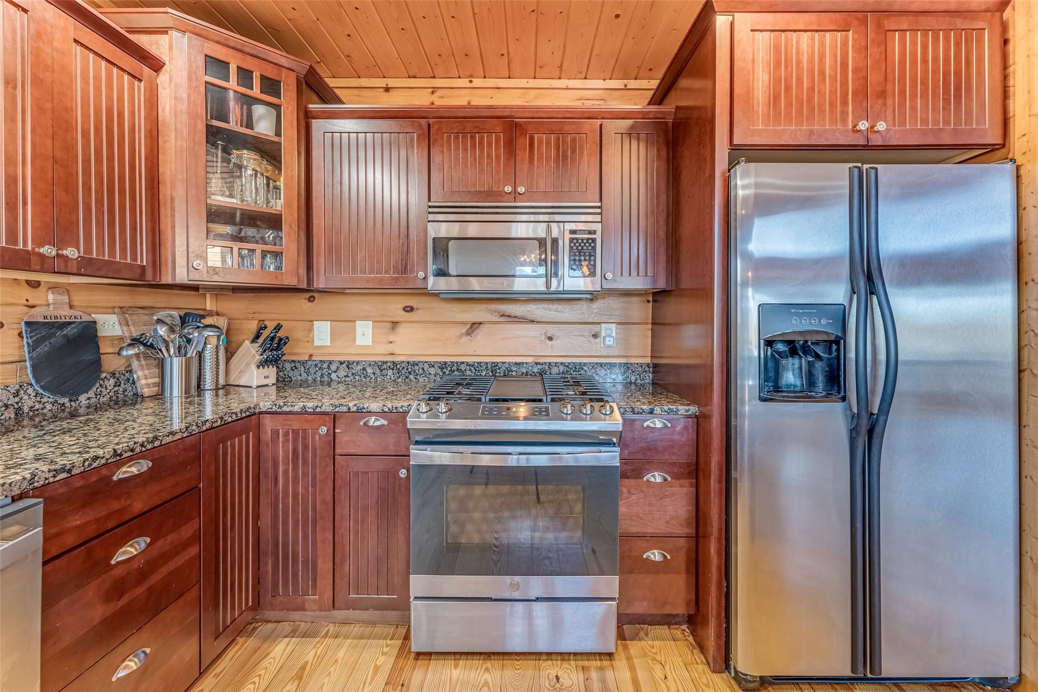 61 North Boundary Rd Mill Spring Mill Spring, NC 28756 - Photo 11 of 46 a kitchen with granite countertop a refrigerator and a sink