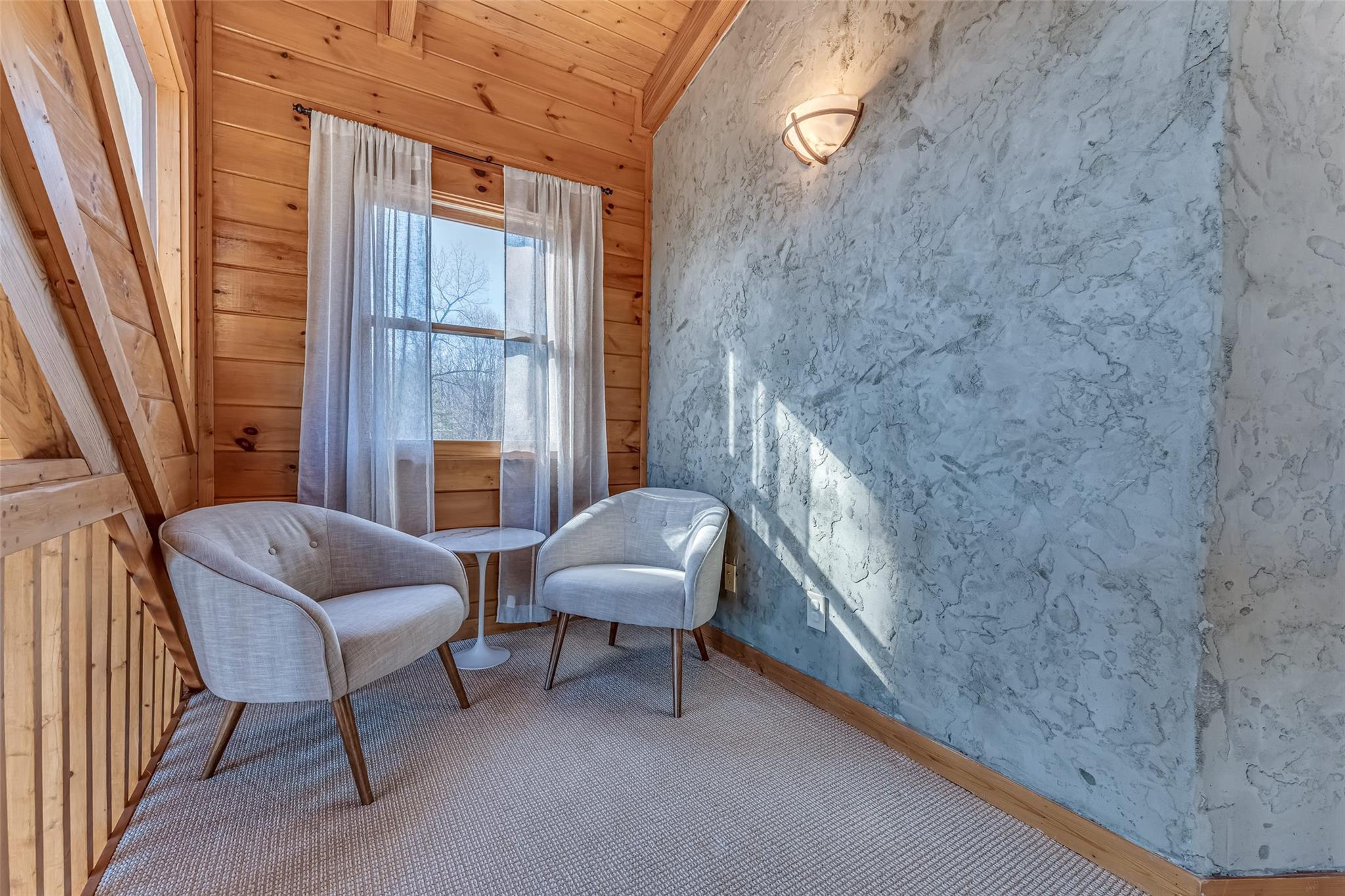 61 North Boundary Rd Mill Spring Mill Spring, NC 28756 - Photo 21 of 46 a living room with furniture and a window