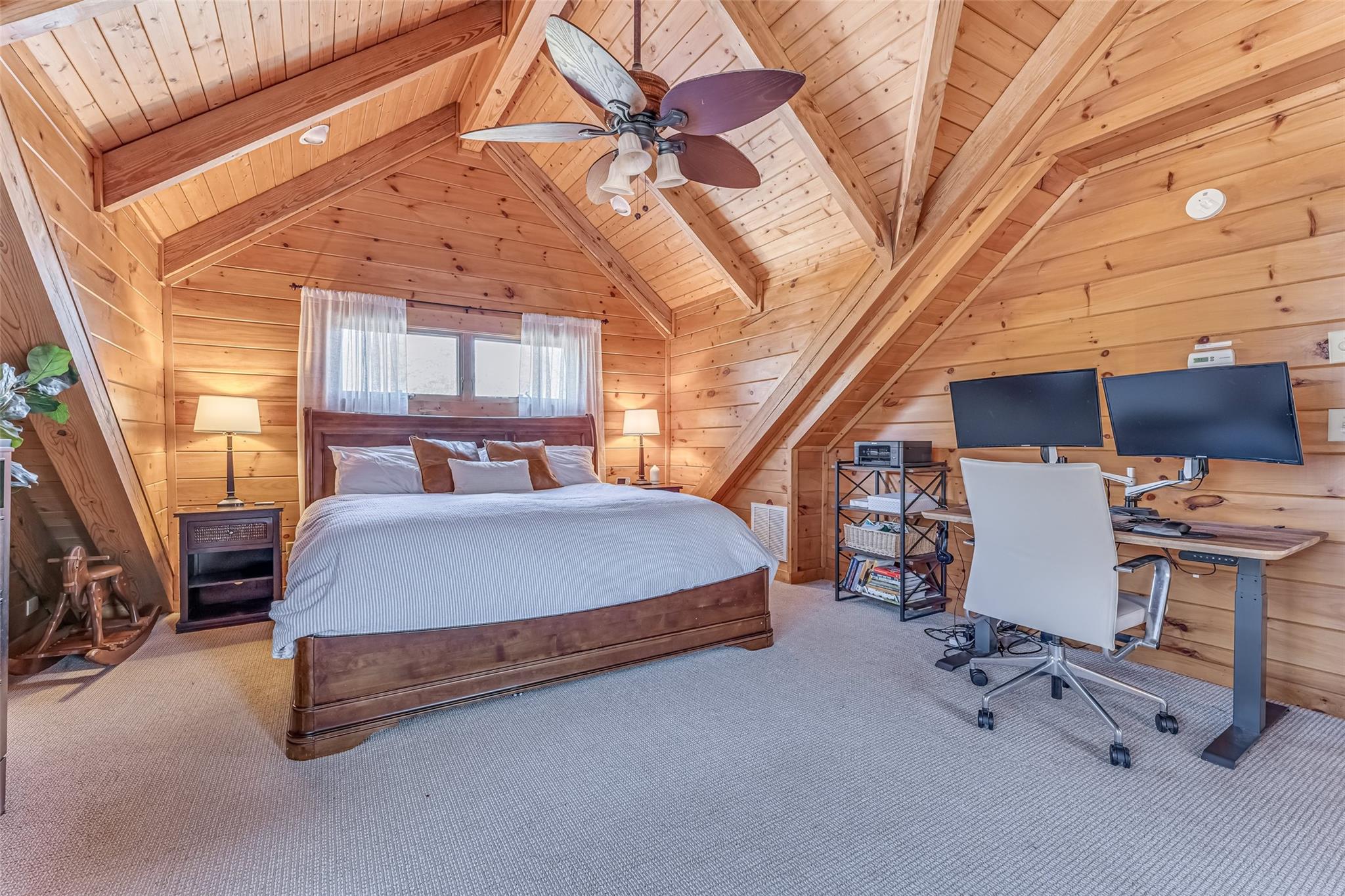 61 North Boundary Rd Mill Spring Mill Spring, NC 28756 - Photo 23 of 46 a bedroom with a bed and large cabinets