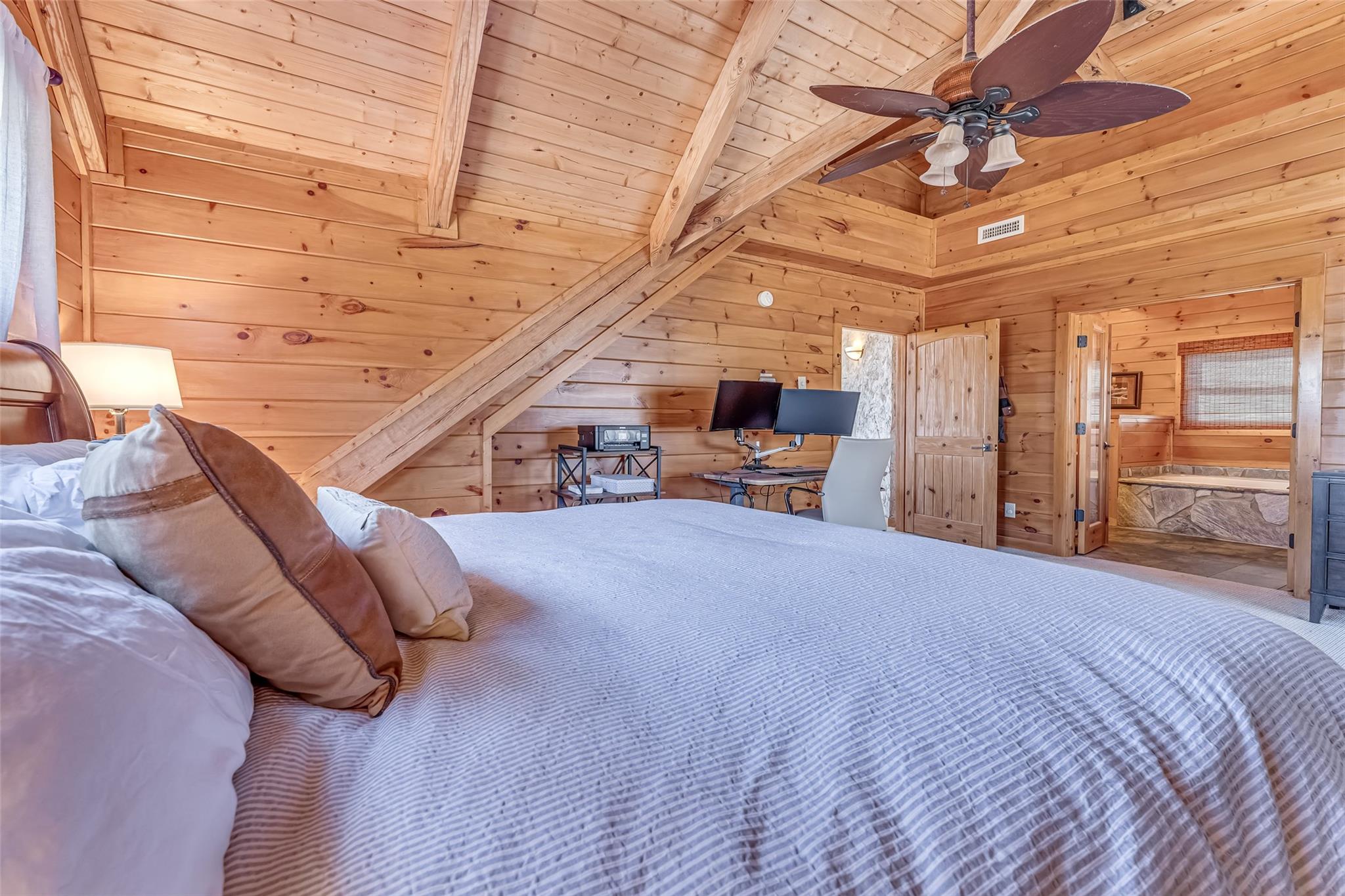 61 North Boundary Rd Mill Spring Mill Spring, NC 28756 - Photo 24 of 46 a bedroom with furniture and a large window