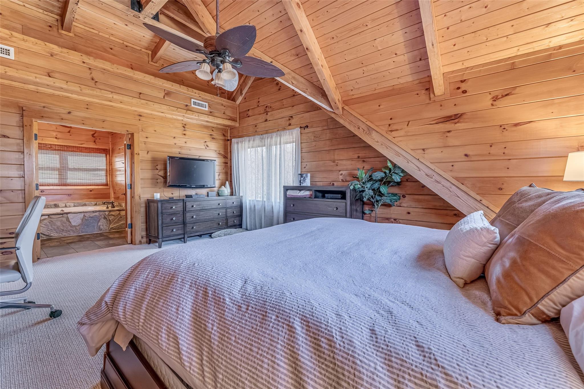 61 North Boundary Rd Mill Spring Mill Spring, NC 28756 - Photo 25 of 46 a bed room with a bed and a television