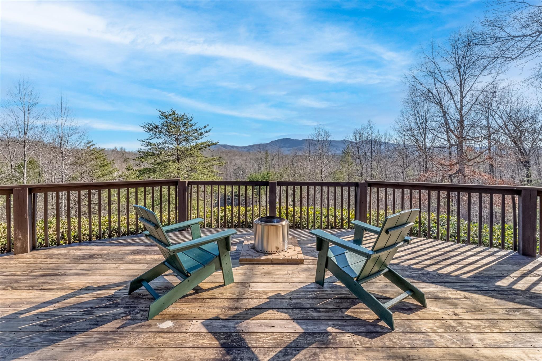 61 North Boundary Rd Mill Spring Mill Spring, NC 28756 - Photo 36 of 46 a view of a wooden deck with a bench