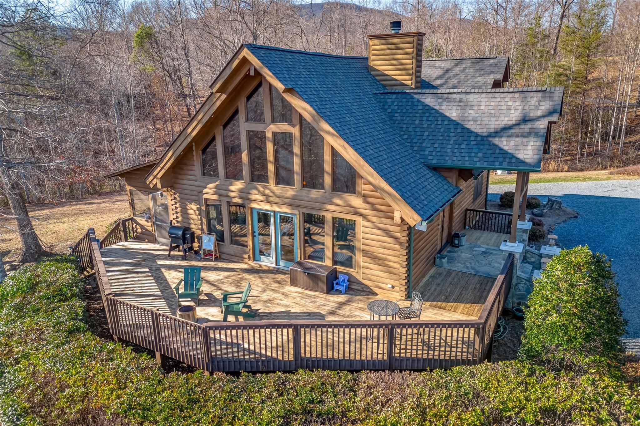 61 North Boundary Rd Mill Spring Mill Spring, NC 28756 - Photo 38 of 46 a view of a wooden deck front of house