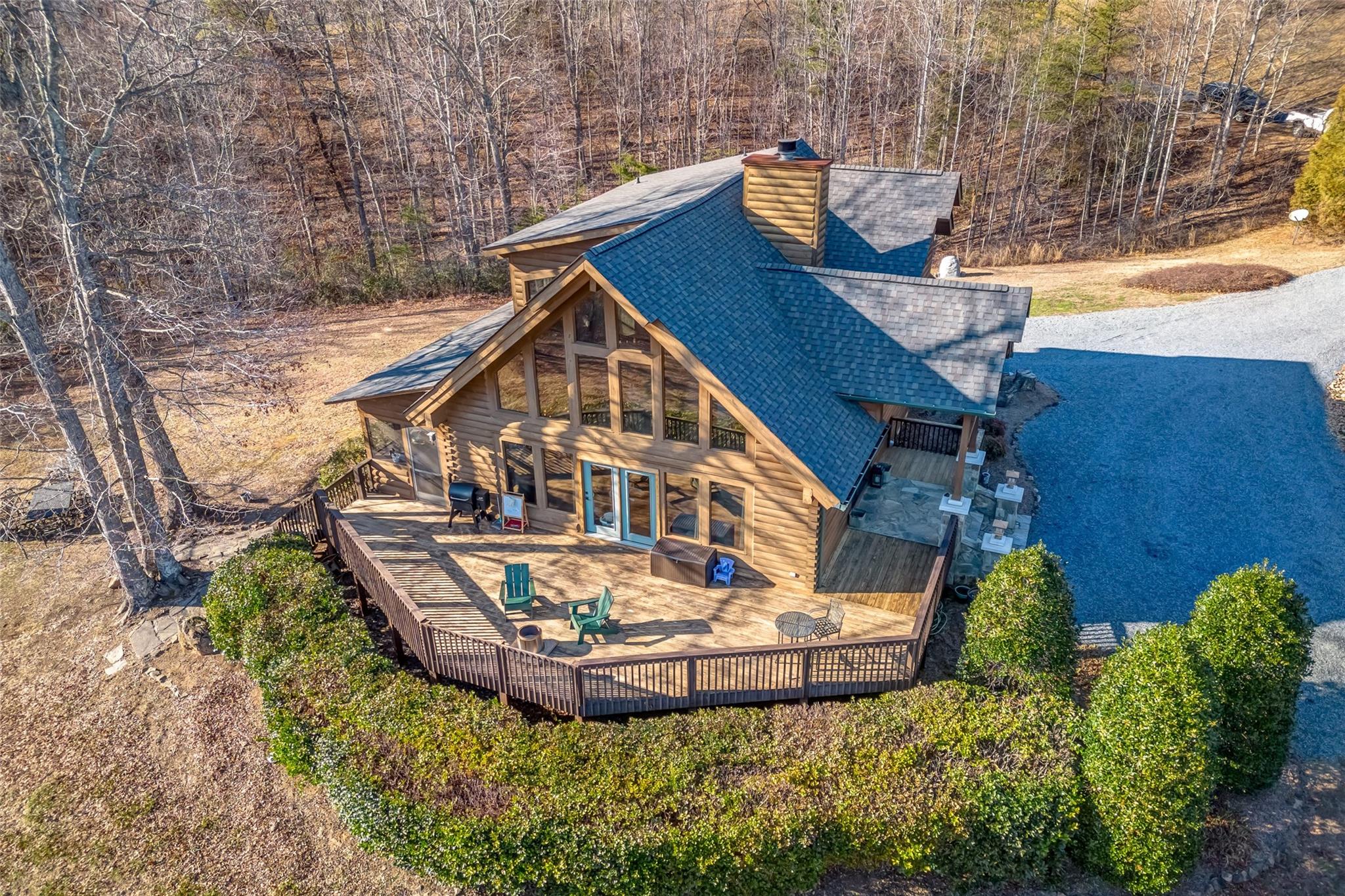 61 North Boundary Rd Mill Spring Mill Spring, NC 28756 - Photo 40 of 46 a view of a house with roof deck and sitting area