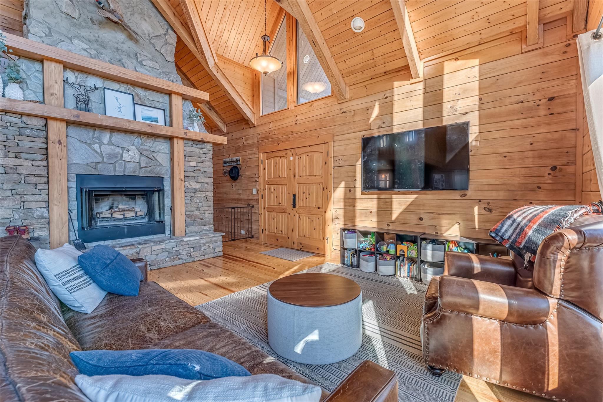 61 North Boundary Rd Mill Spring Mill Spring, NC 28756 - Photo 4 of 46 a living room with furniture and a fireplace