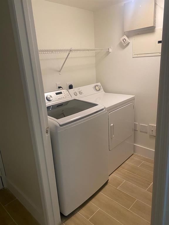 2457 Centergate Drive, Unit 302 Miramar, FL 33025 - Photo 9 of 10 a utility room with dryer and washer