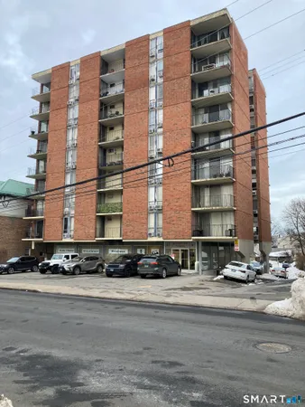 a tall building sitting on the side of a street