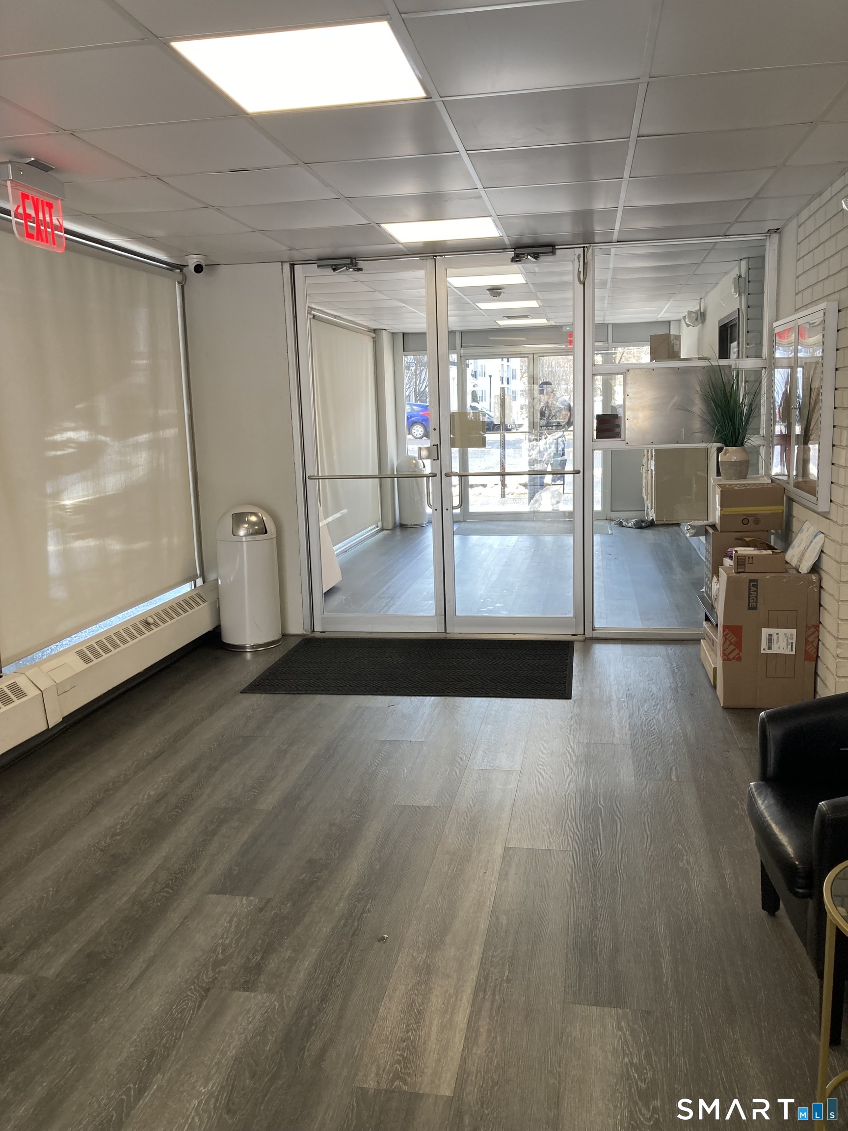 87 Glenbrook Road, Unit 6E Stamford, CT 06902 - Photo 12 of 23 a view of a room with wooden floor