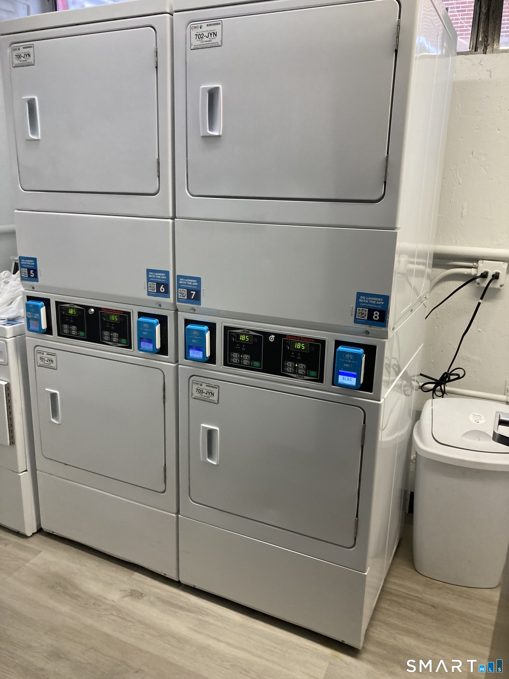 87 Glenbrook Road, Unit 6E Stamford, CT 06902 - Photo 18 of 23 a utility room with dryer and washer