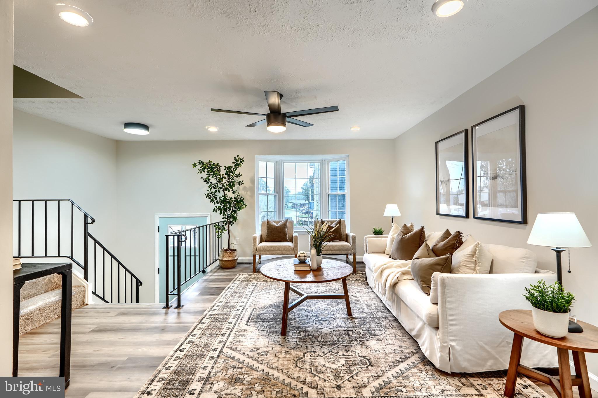 4008 Rustico Road Baltimore, MD 21220 - Photo 1 of 37 a living room with furniture and a window