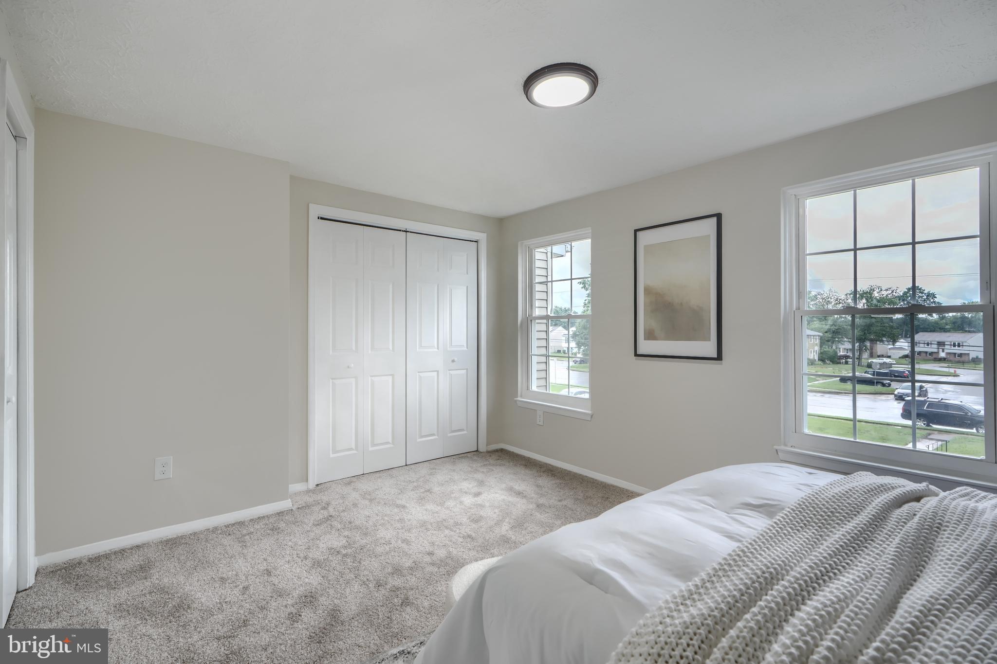 4008 Rustico Road Baltimore, MD 21220 - Photo 16 of 37 a bedroom with a bed and a window