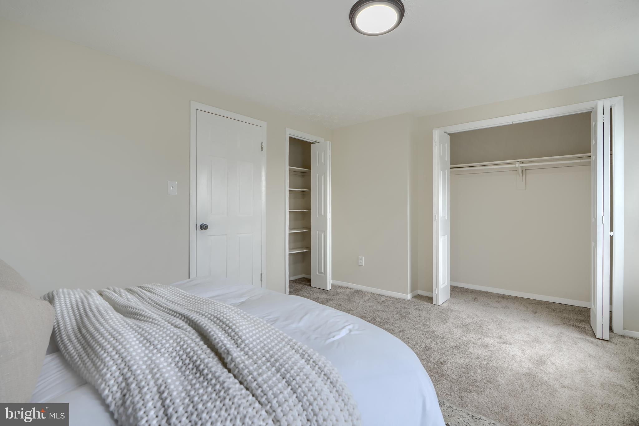 4008 Rustico Road Baltimore, MD 21220 - Photo 17 of 37 a bedroom with a bed and bathroom