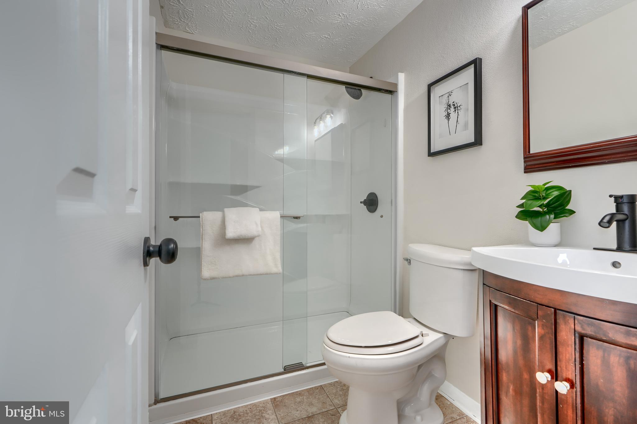 4008 Rustico Road Baltimore, MD 21220 - Photo 18 of 37 a bathroom with a sink and toilet