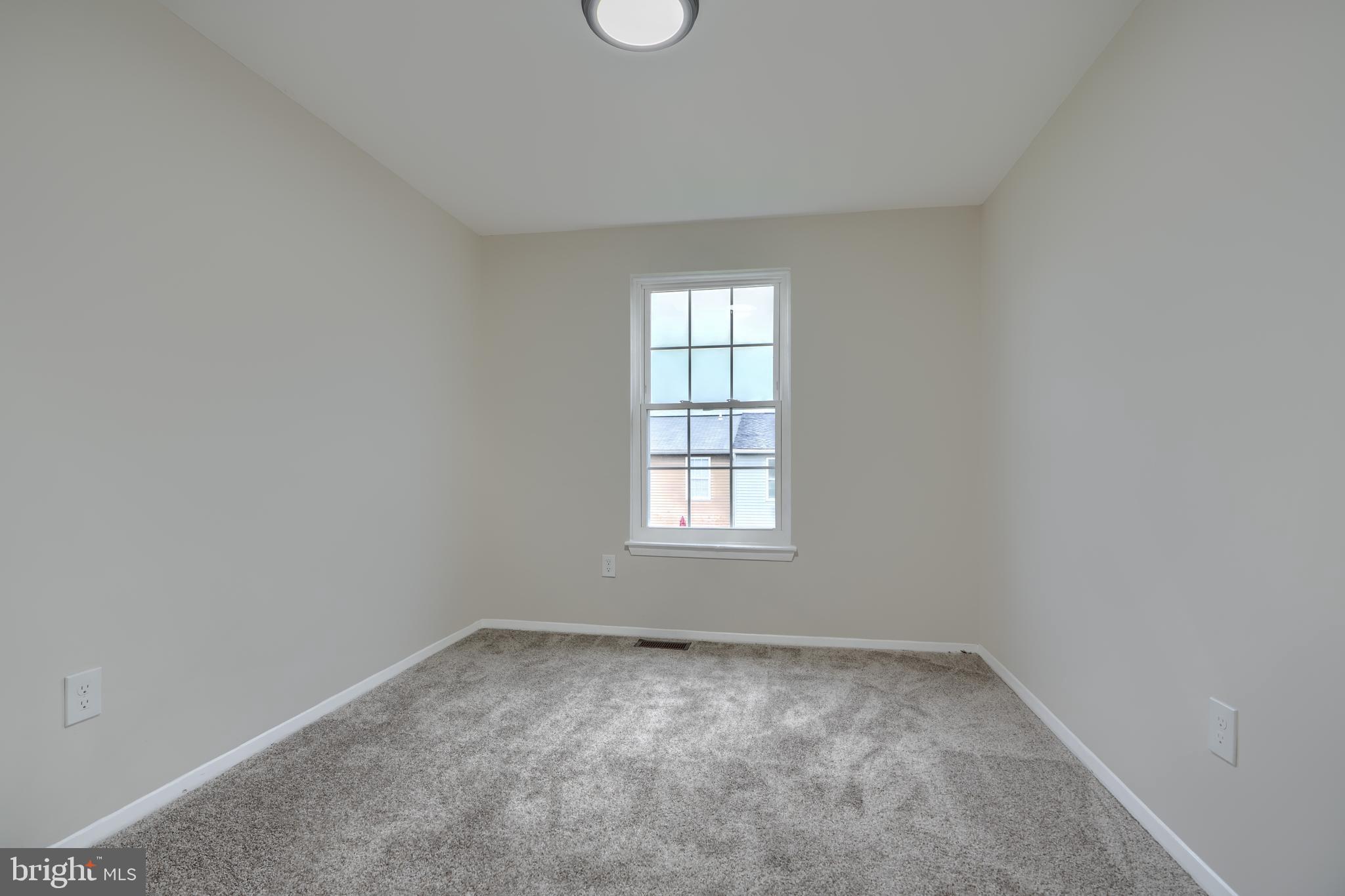 4008 Rustico Road Baltimore, MD 21220 - Photo 20 of 37 an empty room with a window