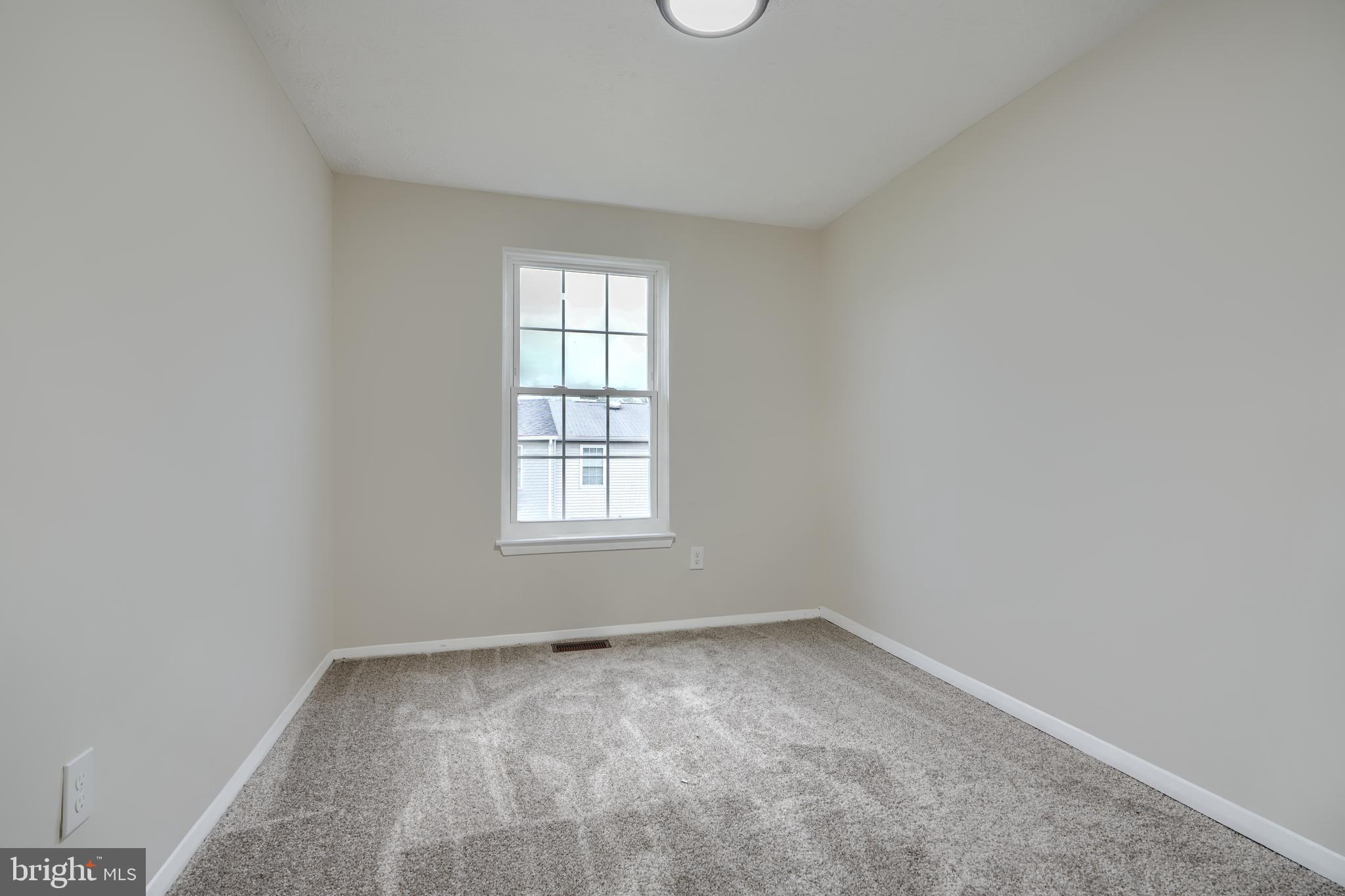 4008 Rustico Road Baltimore, MD 21220 - Photo 22 of 37 an empty room with a window