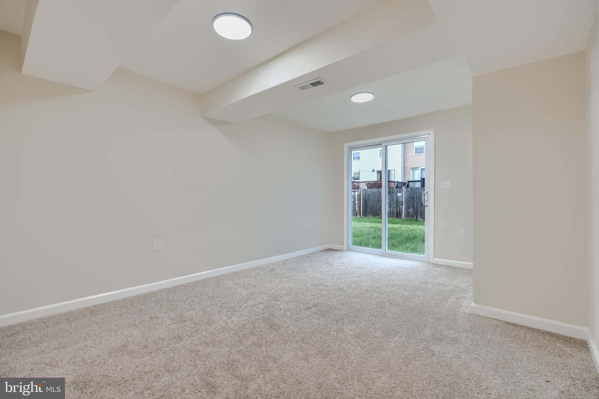 4008 Rustico Road Baltimore, MD 21220 - Photo 24 of 37 an empty room with windows and closet