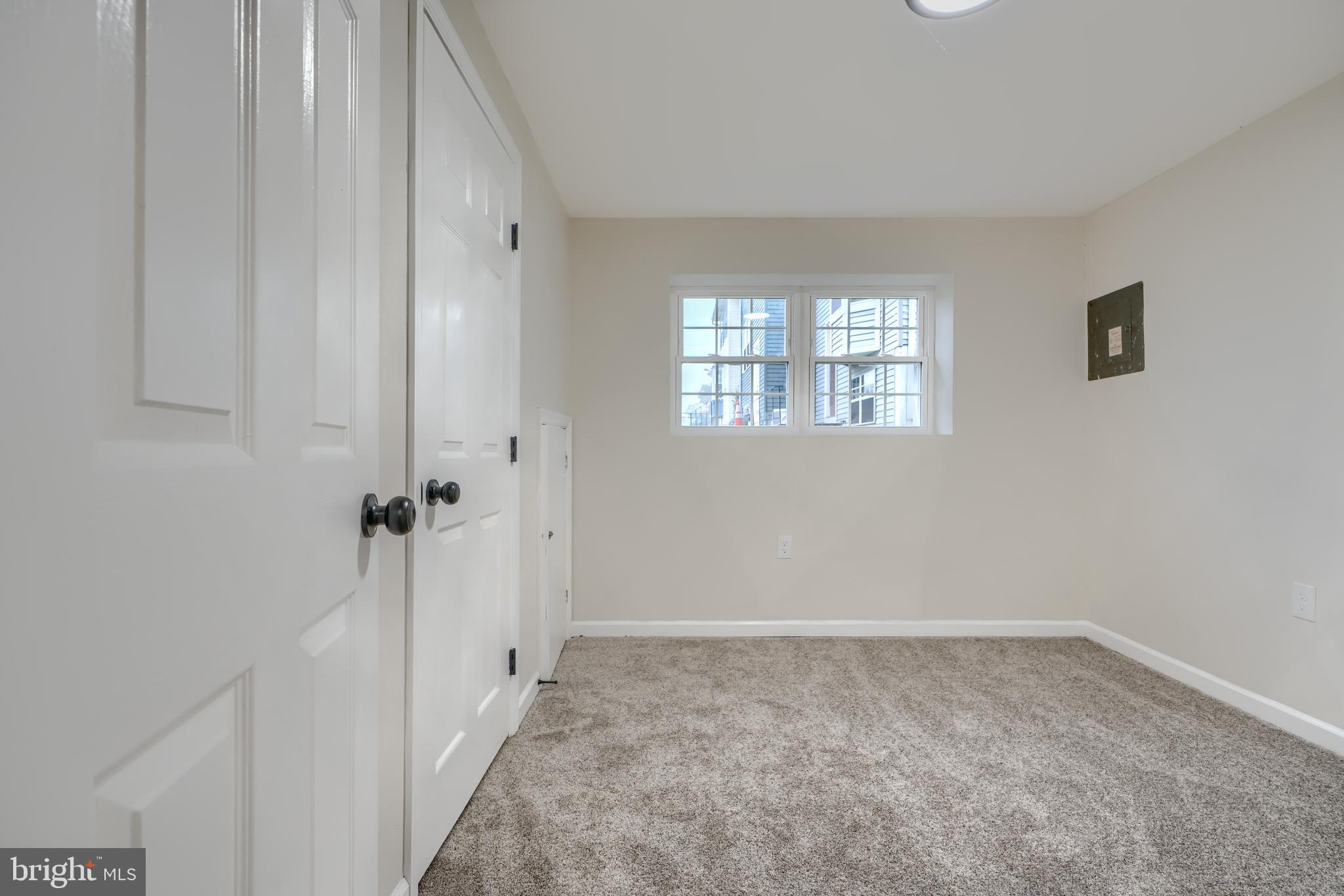 4008 Rustico Road Baltimore, MD 21220 - Photo 26 of 37 a view of an empty room with a window