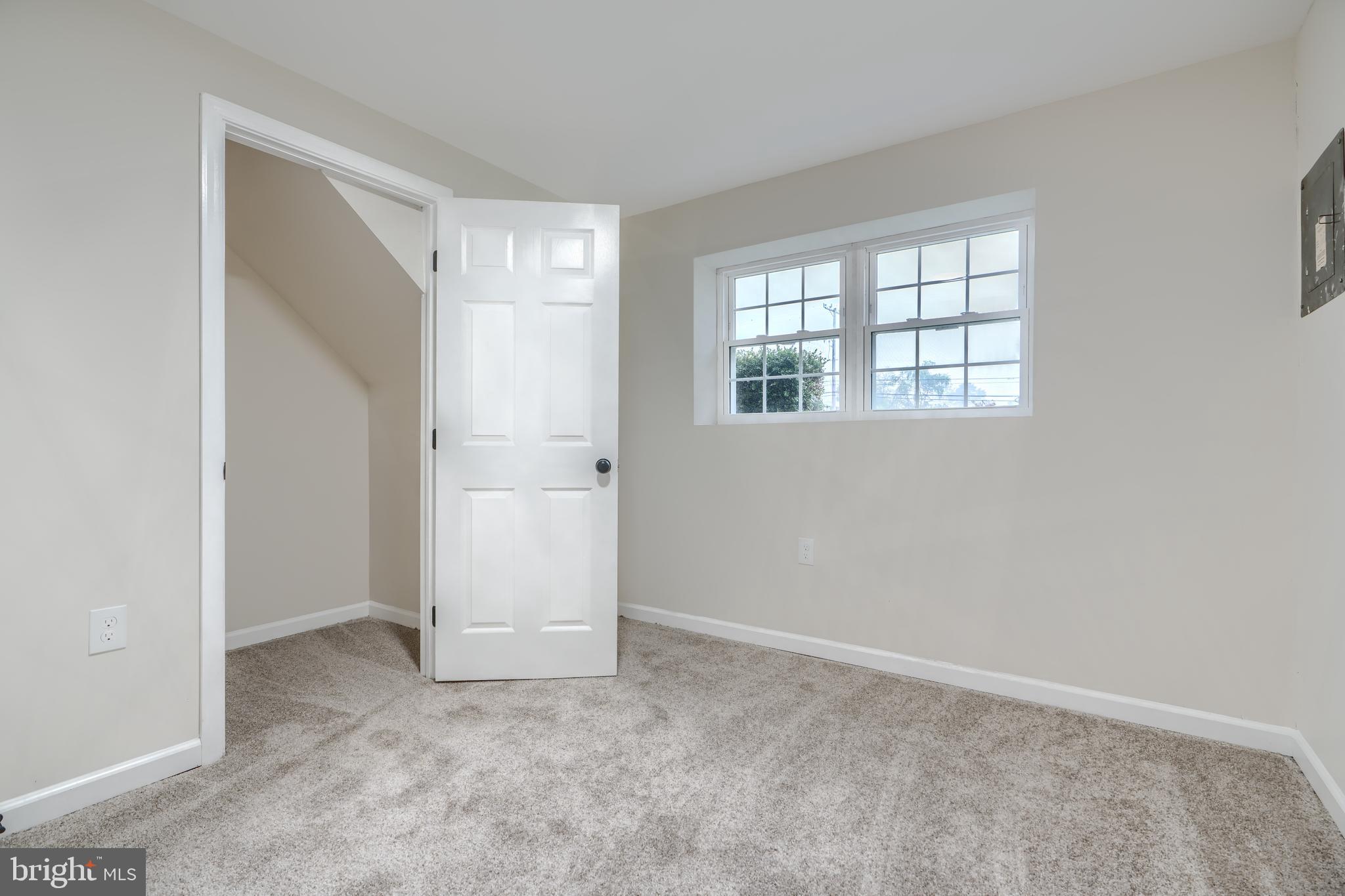 4008 Rustico Road Baltimore, MD 21220 - Photo 29 of 37 a view of an empty room with a window