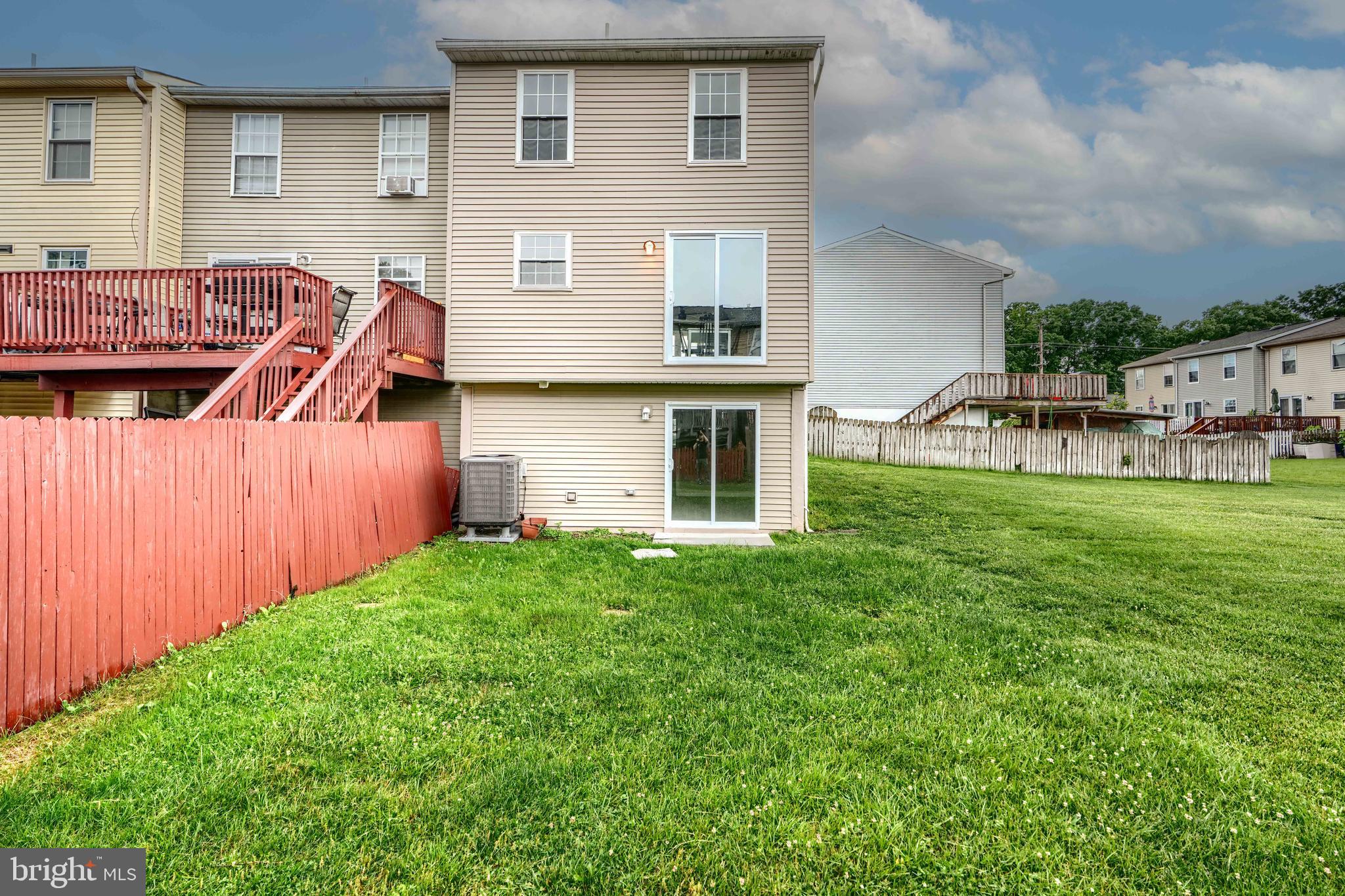 4008 Rustico Road Baltimore, MD 21220 - Photo 33 of 37 a view of a house with a yard