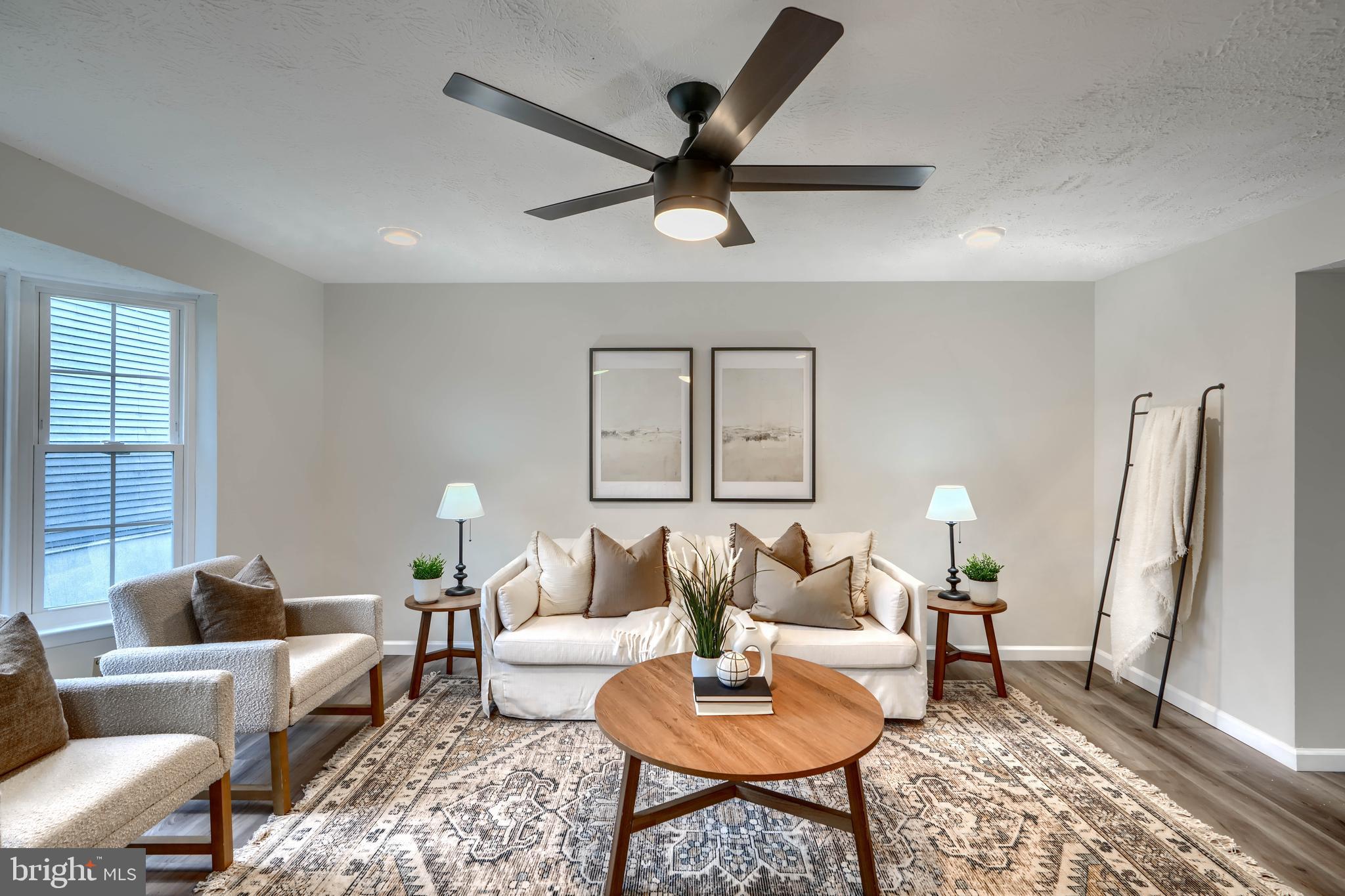 4008 Rustico Road Baltimore, MD 21220 - Photo 4 of 37 a living room with furniture and a large window
