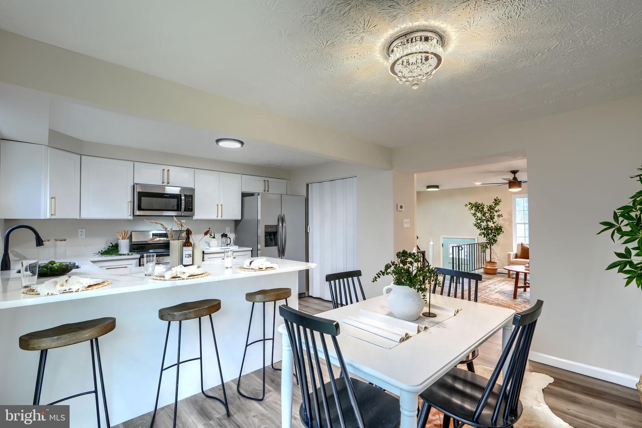 4008 Rustico Road Baltimore, MD 21220 - Photo 8 of 37 a view of a dining room with furniture