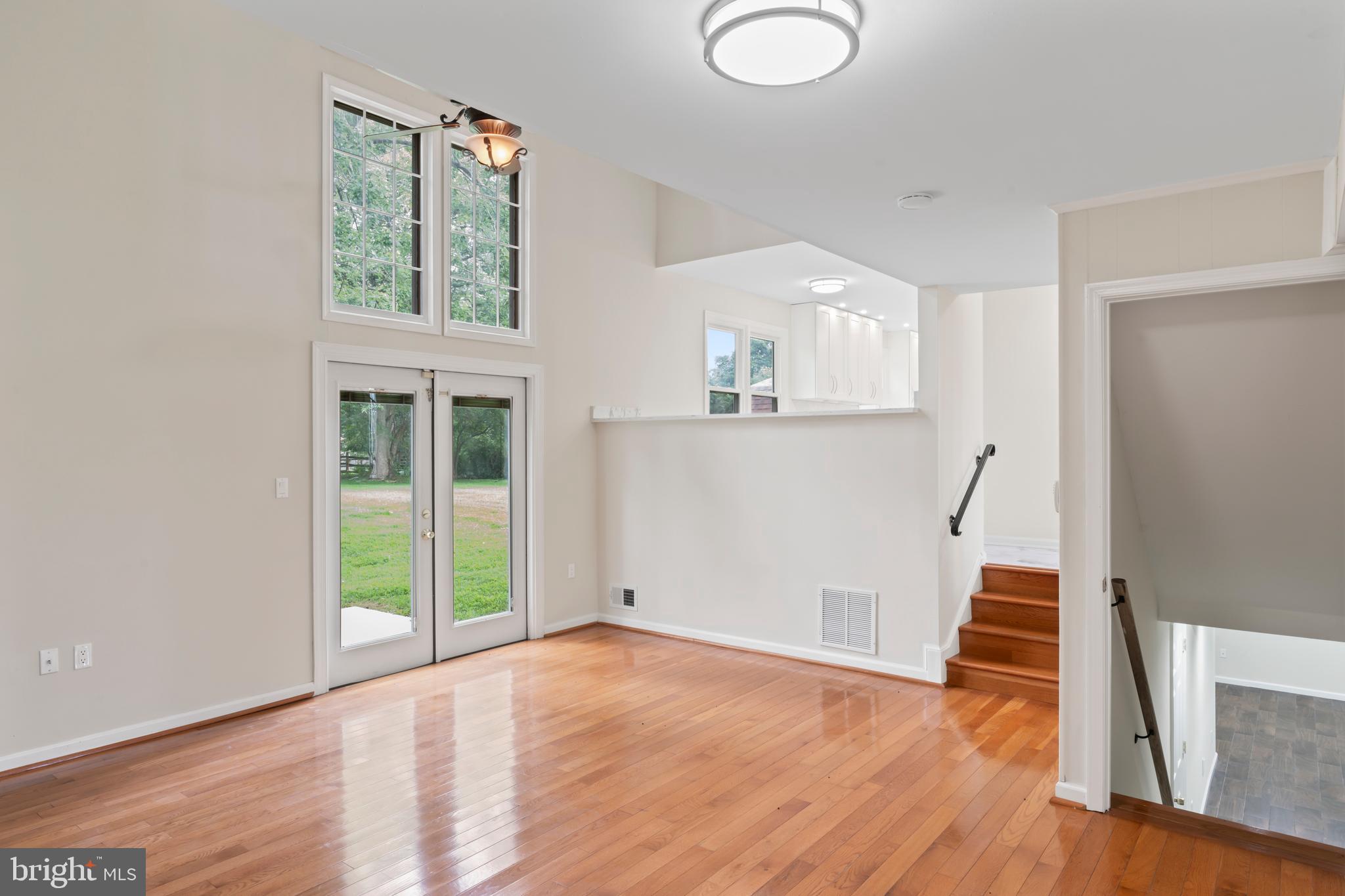 17004 Cashell Road Rockville, MD 20853 - Photo 26 of 80 a view of empty room with wooden floor and fan