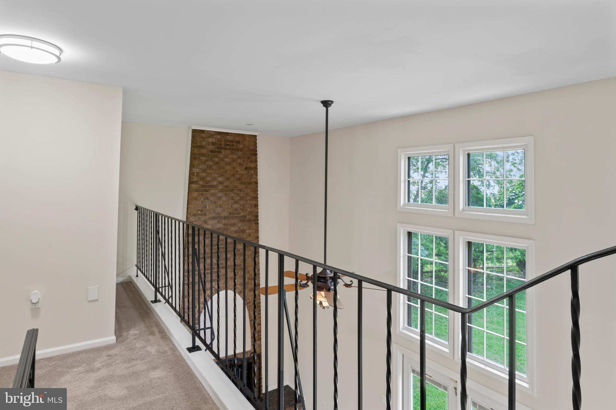 17004 Cashell Road Rockville, MD 20853 - Photo 39 of 80 a view of staircase with wooden floor and stairs