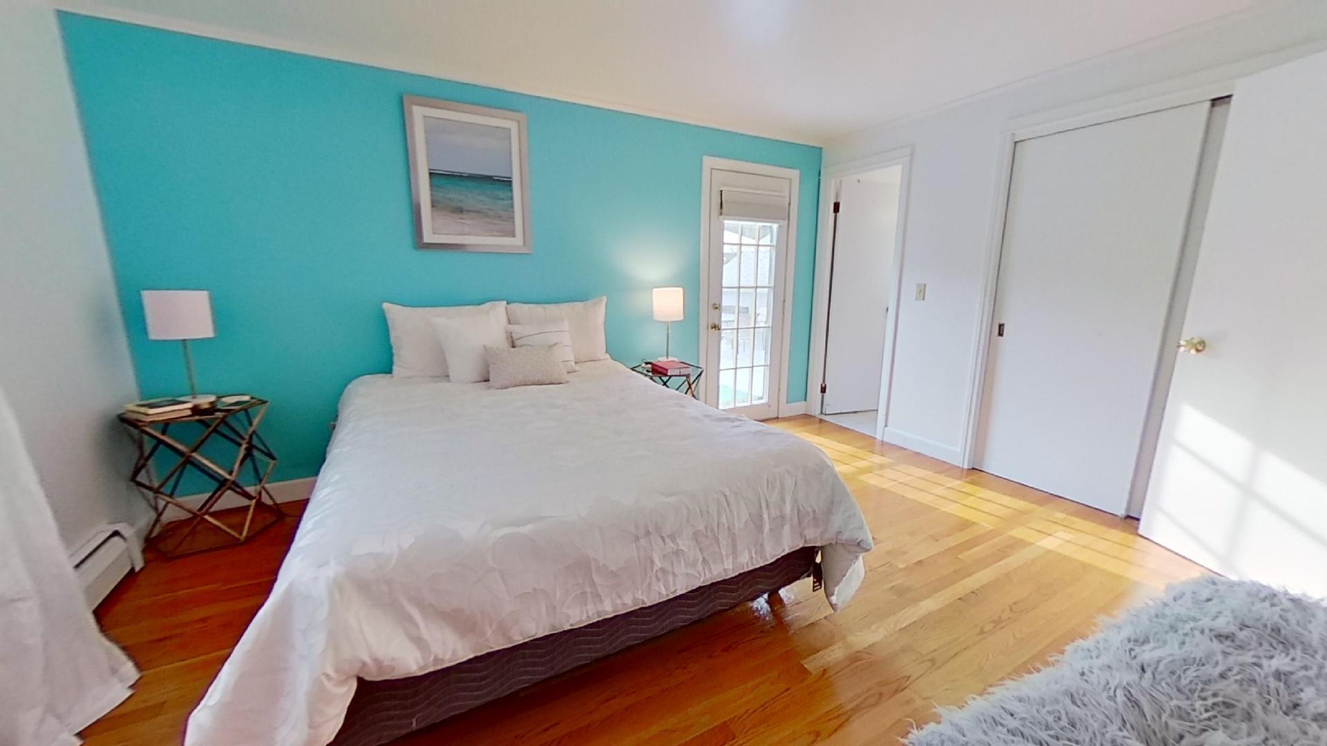 29 Padlock Lane Centerville, MA 02632 - Photo 12 of 33 a bed sitting in a bedroom next to a window