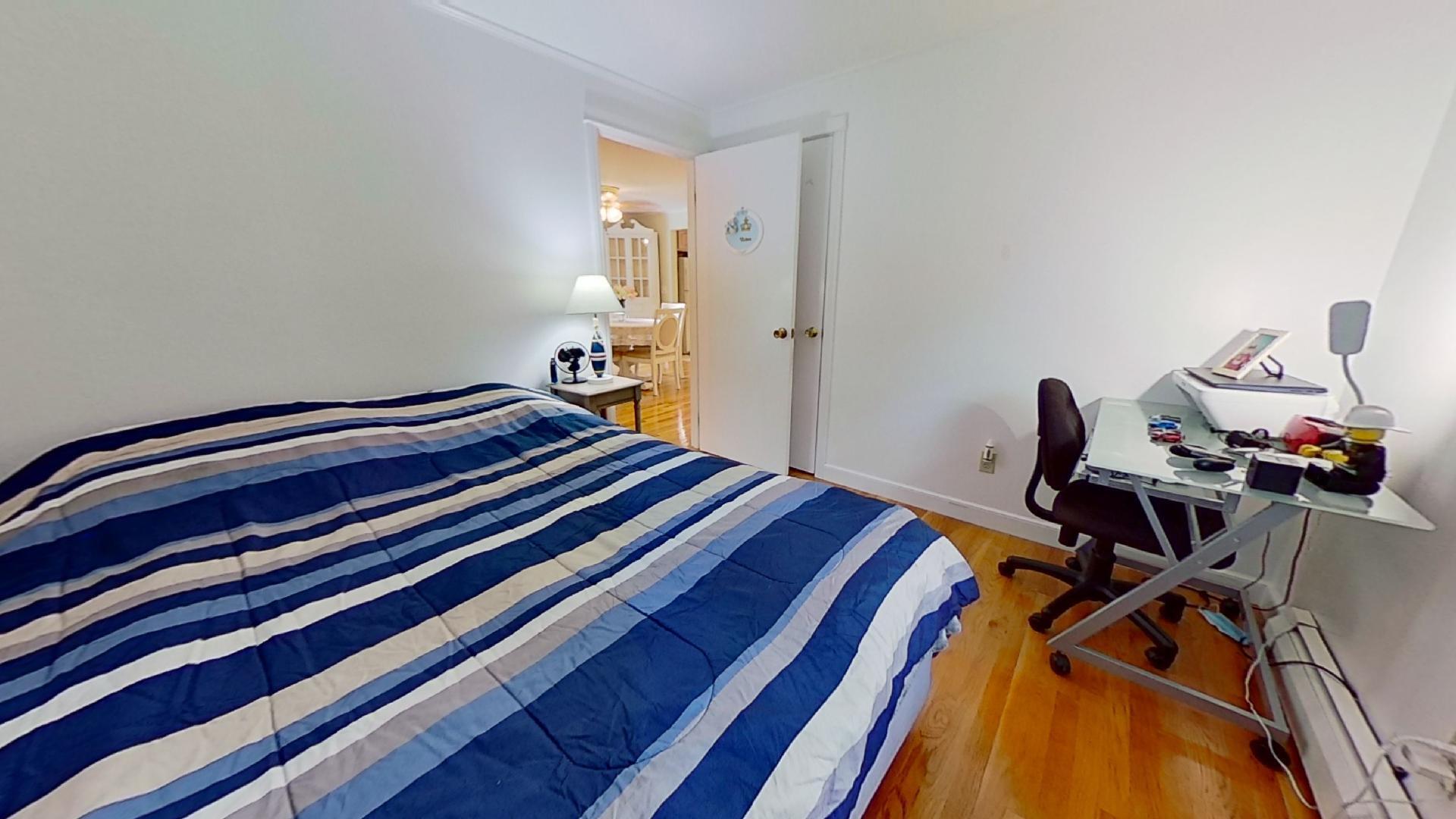 29 Padlock Lane Centerville, MA 02632 - Photo 17 of 33 a bedroom with a bed and wooden floor