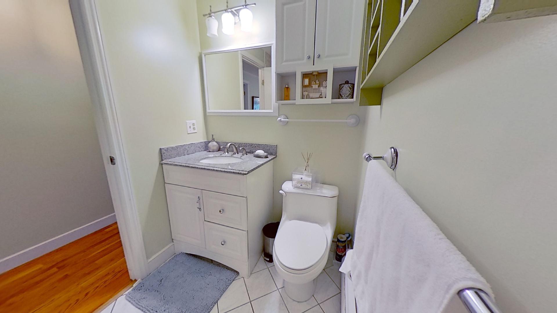 29 Padlock Lane Centerville, MA 02632 - Photo 23 of 33 a bathroom with a sink toilet and vanity