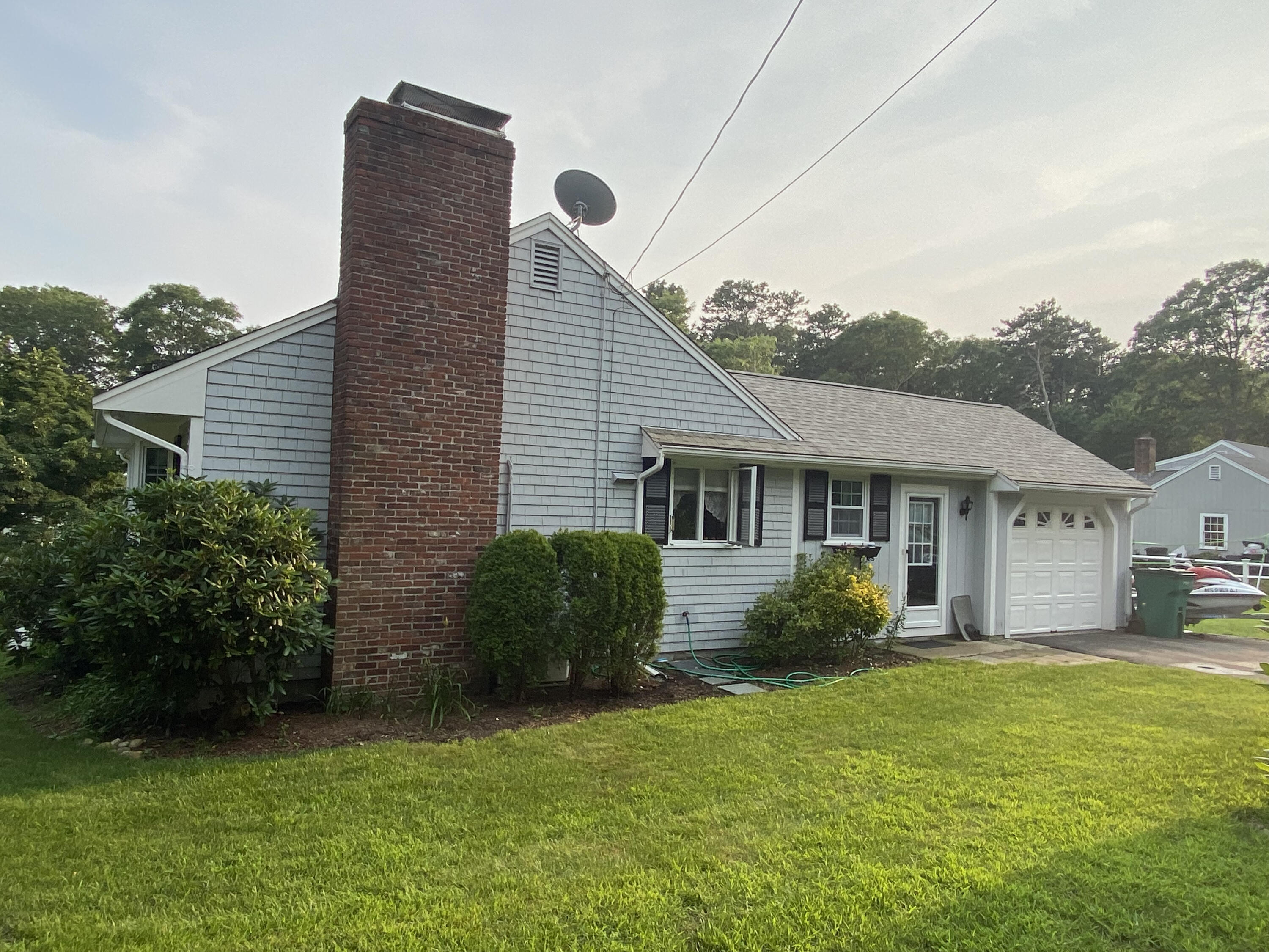 29 Padlock Lane Centerville, MA 02632 - Photo 33 of 33 a view of a house with backyard and garden
