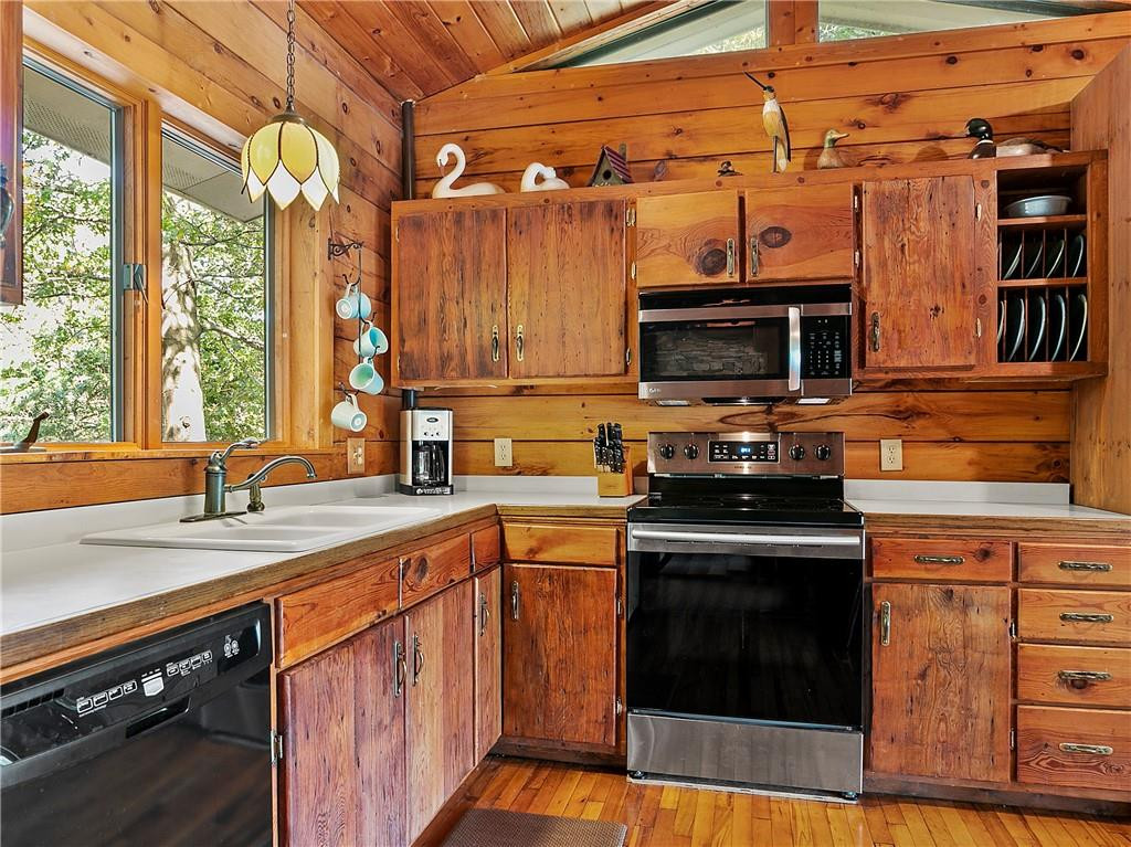 1641 Concord Church Road Roxboro, NC 27574 - Photo 18 of 30 a kitchen with a stove and a sink