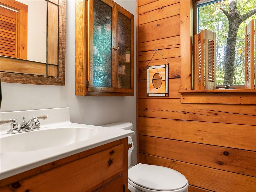 1641 Concord Church Road Roxboro, NC 27574 - Photo 20 of 30 a bathroom with a toilet sink and mirror