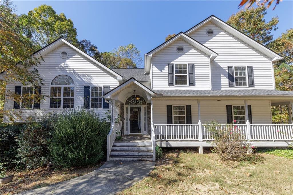 411 Maple Ridge White, GA 30184 - Photo 1 of 1 View of front of home with a porch