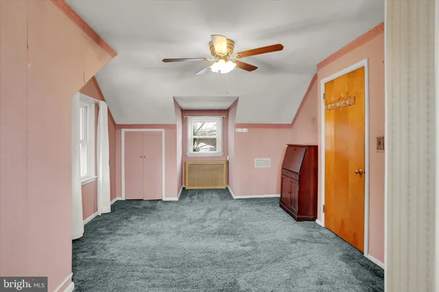 a view of a livingroom with a staircase