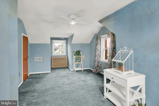 a view of livingroom with furniture and windows