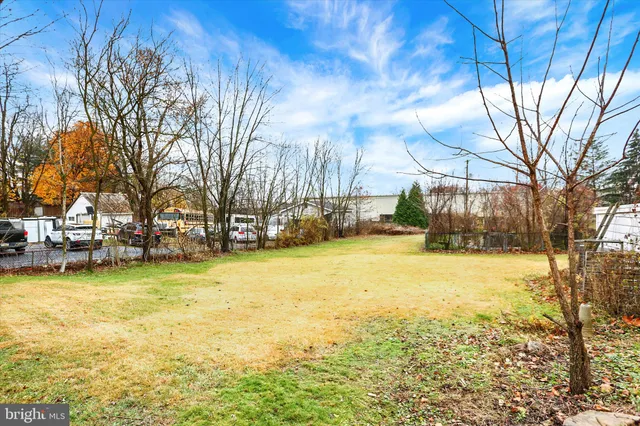 a view of a swimming pool with an outdoor space and seating area