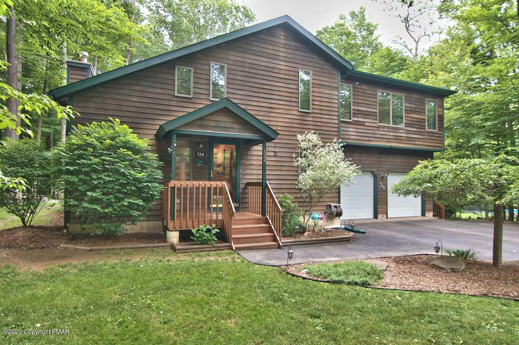 124 Anna Road Blakeslee, PA 18610 - Photo 54 of 66 a view of a house with backyard and a garden