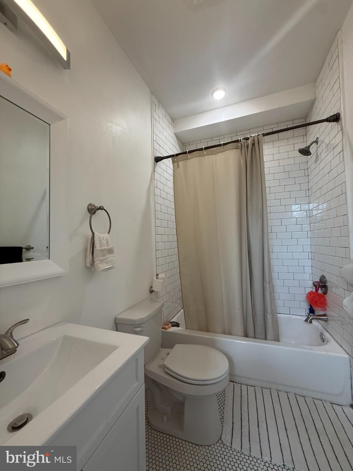 2005 North Mascher Street, Unit B Philadelphia, PA 19122 - Photo 13 of 31 a bathroom with a sink a toilet and shower