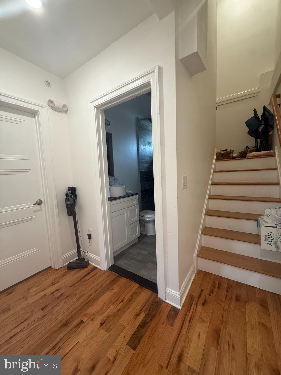 2005 North Mascher Street, Unit B Philadelphia, PA 19122 - Photo 17 of 31 a view of a hallway with wooden floor and staircase
