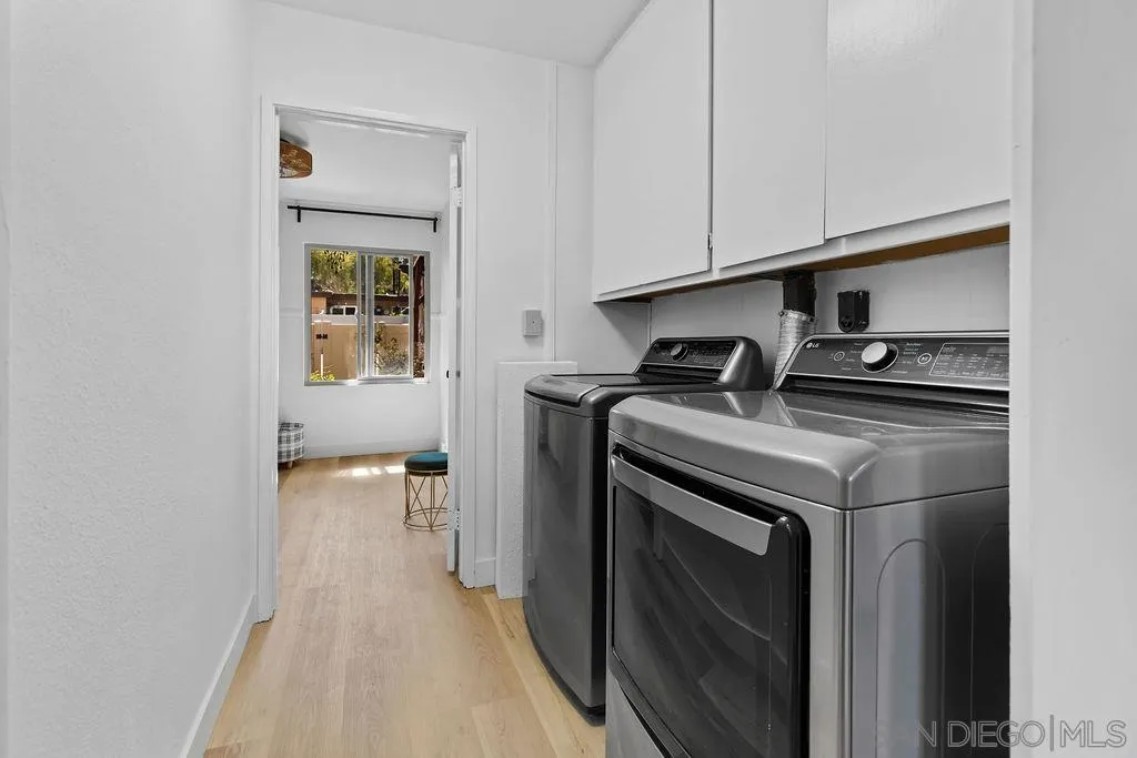 8722 Wahl Street Santee, CA 92071 - Photo 18 of 35 a utility room with sink dryer and washer