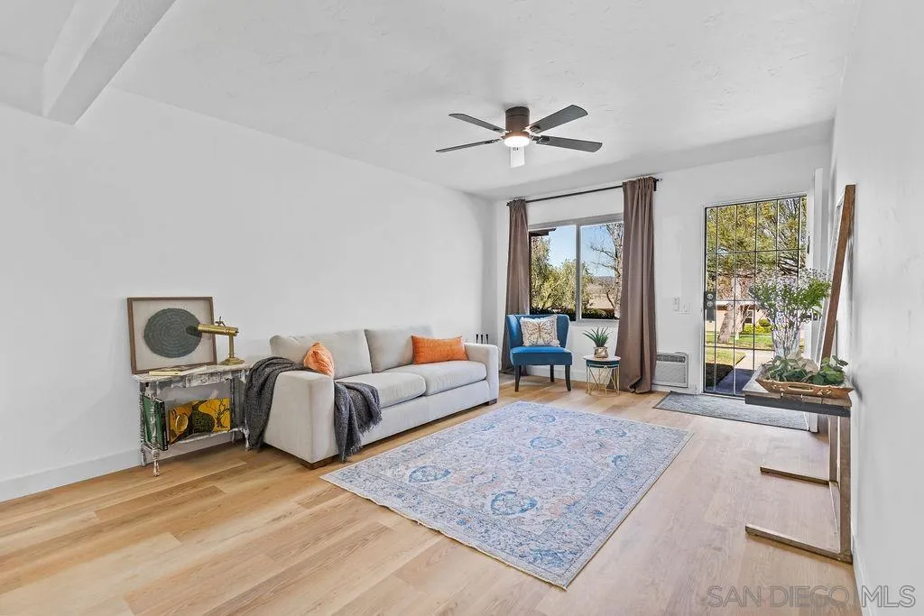 8722 Wahl Street Santee, CA 92071 - Photo 7 of 35 a living room with furniture and a large window