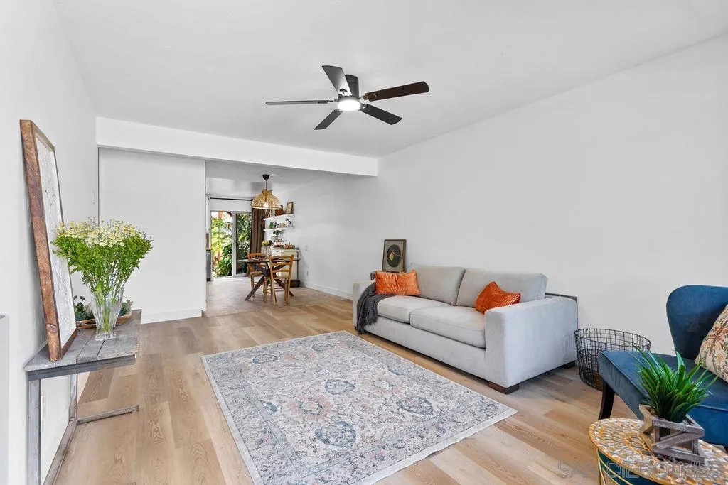 8722 Wahl Street Santee, CA 92071 - Photo 8 of 35 a living room with furniture and a potted plant