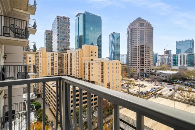a view of city with tall buildings
