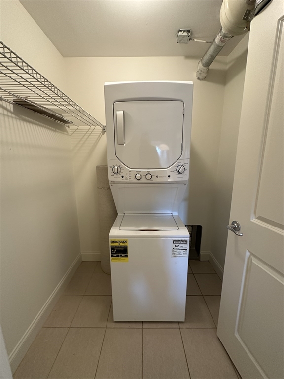 318 Rindge Avenue, Unit 216 Cambridge, MA 02140 - Photo 14 of 15 a utility room with a washer and dryer